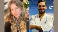 Modelo brasileira foi clicada segurando o bebê de 7 meses no colo na companhia do professor de jiu-jítsu