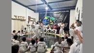 Ação do Projeto Biriba une capoeira, cultura afro-brasileira e preservação ambiental em atividade aberta à comunidade.