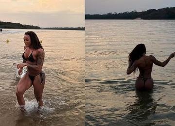 Patrícia Ramos exibe supercoxas na praia e físico chama atenção